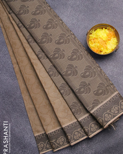 Coimbatore cotton saree sap green and black with allover self emboss and thread woven border
