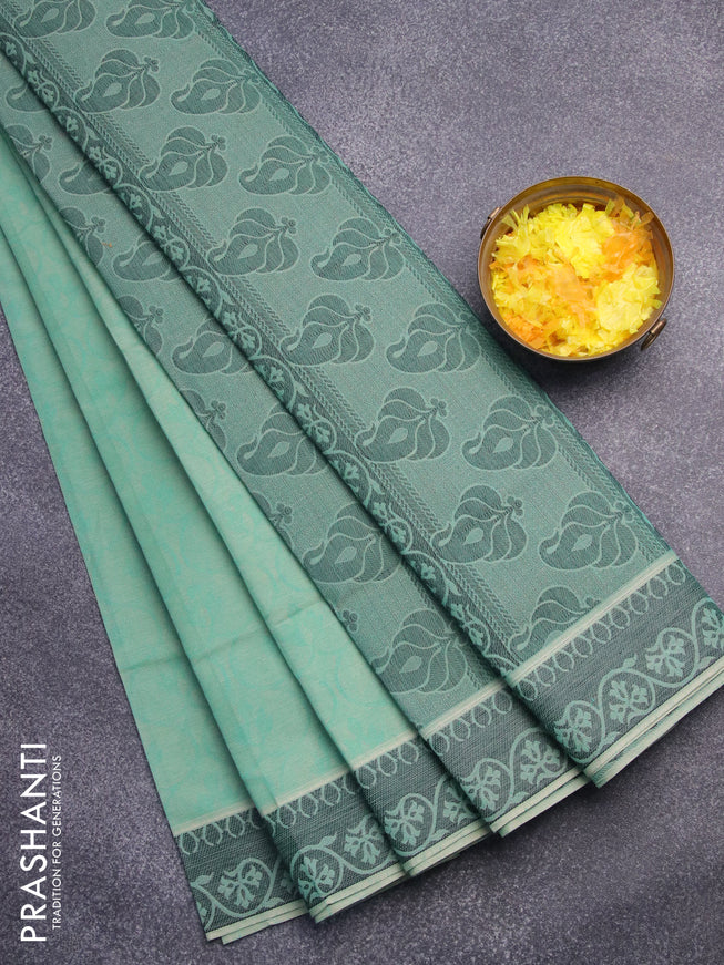 Coimbatore cotton saree teal green and black with allover self emboss and thread woven border