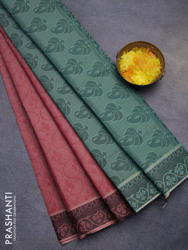 Coimbatore cotton saree red shade and teal green with allover self emboss and thread woven border