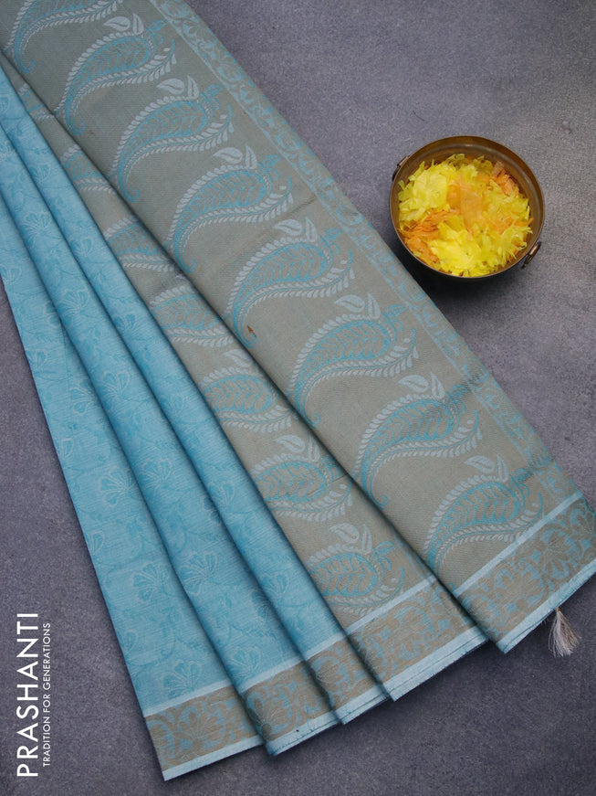 Coimbatore cotton saree teal blue and chikku shade with allover self emboss and thread woven border