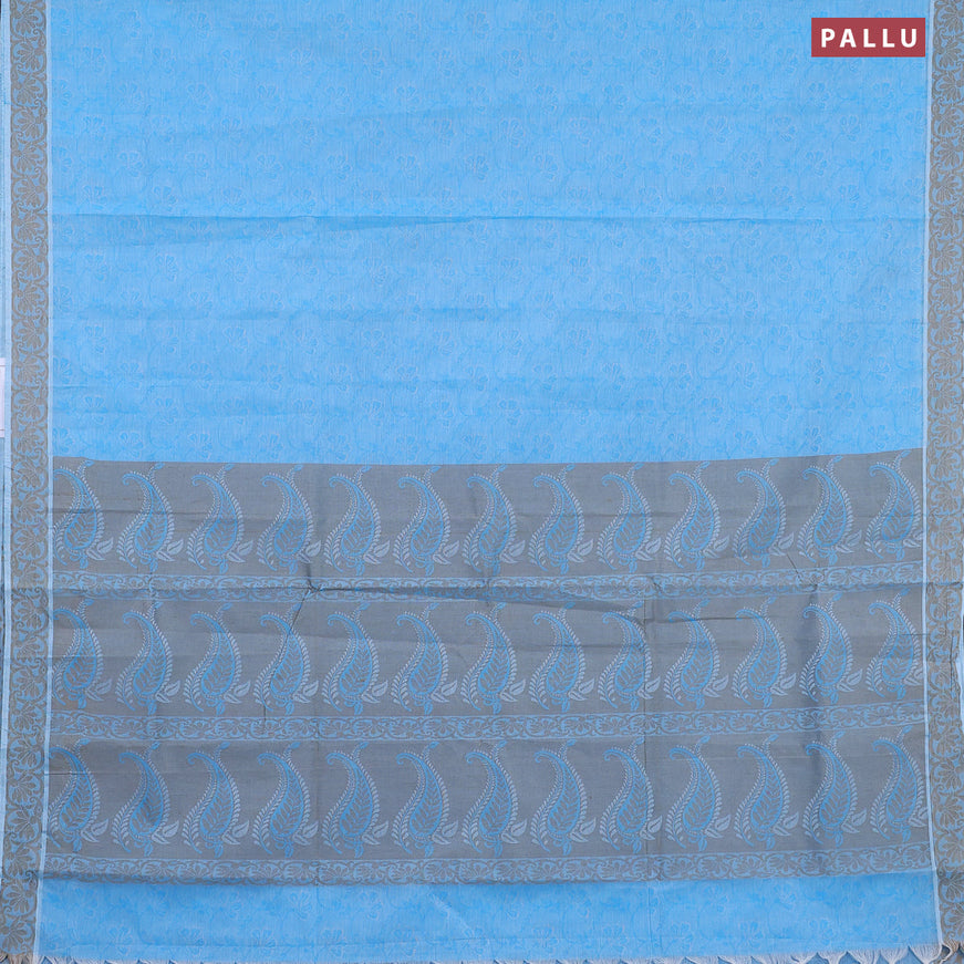 Coimbatore cotton saree light blue and chikku shade with allover self emboss and thread woven border