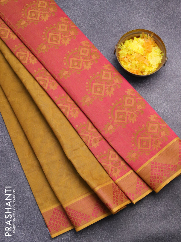 Coimbatore cotton saree mustard shade and pink with allover self emboss and thread woven border