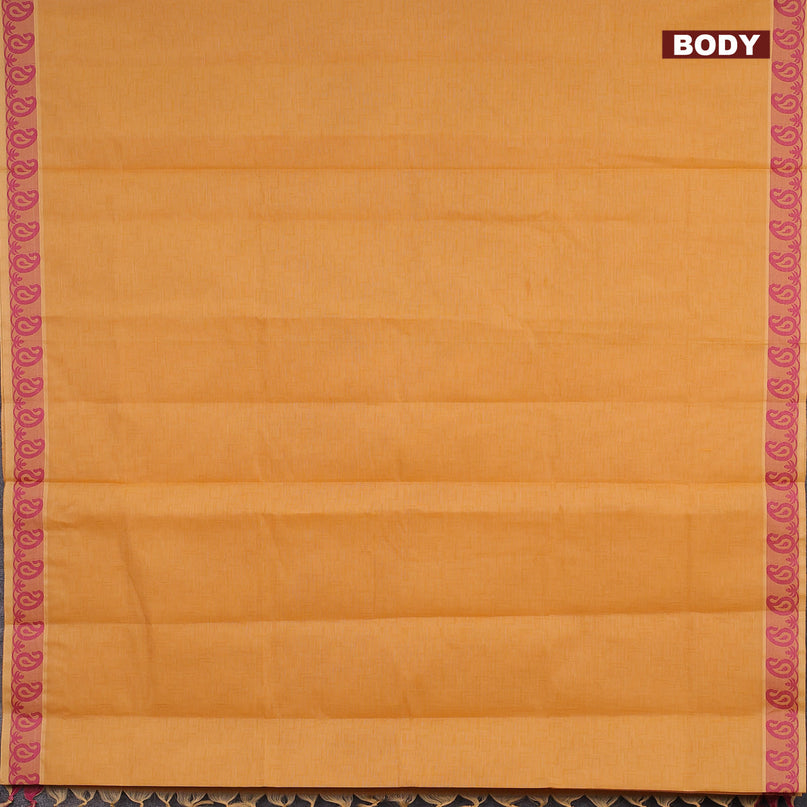 Coimbatore cotton saree mustard yellow and pink with allover self emboss and thread woven border