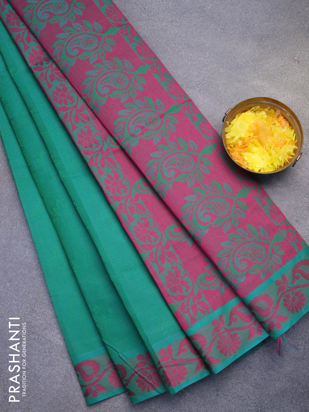Coimbatore cotton saree dual shade of green and magenta pink with allover self emboss and thread woven border