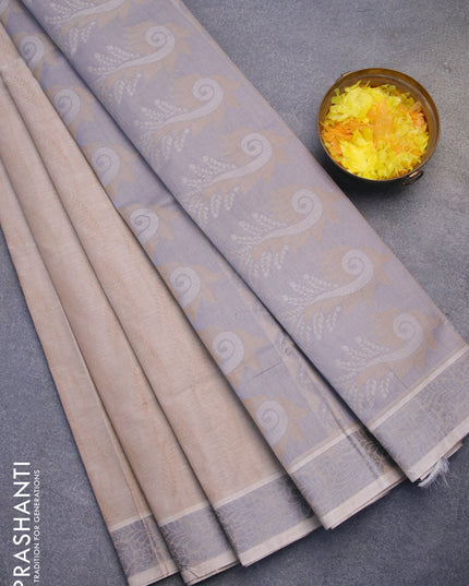 Coimbatore cotton saree chikku shade and grey with allover self emboss and thread woven border