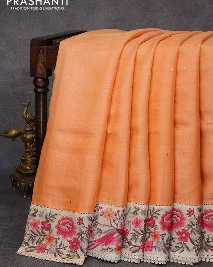 Pure tussar silk saree orange and cream with allover mirror work and floral design embroidery work border