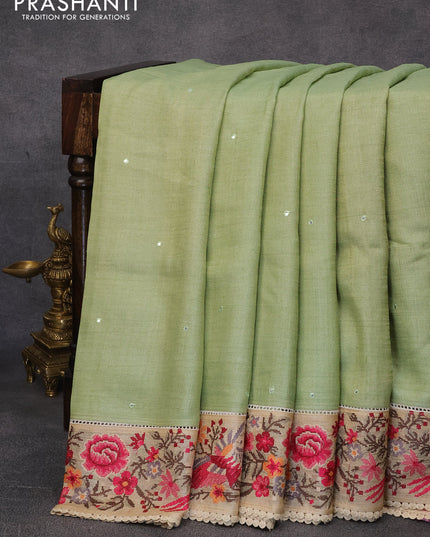 Pure tussar silk saree pista green and sandal with allover mirror work and floral design embroidery work border