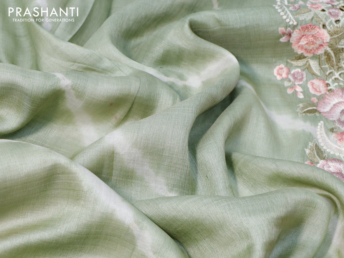 Pure tussar silk saree pastel green with tie & dye prints and floral design embroidery cut work border