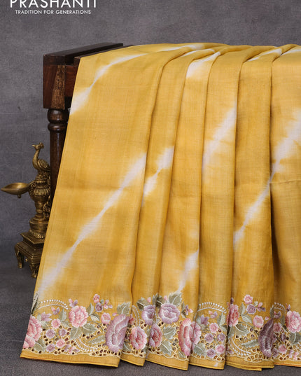 Pure tussar silk saree mustard yellow with tie & dye prints and floral design embroidery cut work border