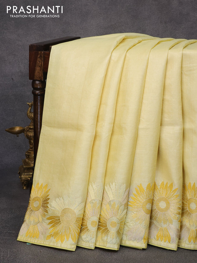 Pure tussar silk saree pale yellow with plain body and floral design embroidery work border