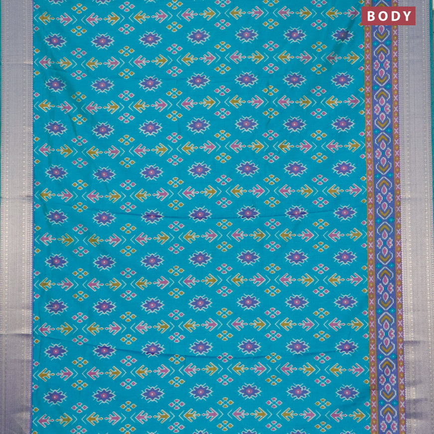 Semi tussar saree dual shade of teal bluish green and dual shade of violet with allover ikat butta weaves and zari woven ikat border