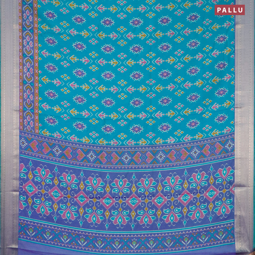 Semi tussar saree dual shade of teal bluish green and dual shade of violet with allover ikat butta weaves and zari woven ikat border