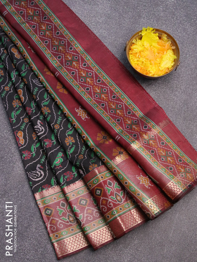 Semi tussar saree black and maroon with allover ikat weaves and zari woven ikat border