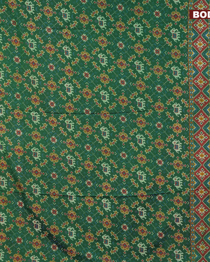 Semi tussar saree green and dual shade of maroonish green with allover ikat weaves and zari woven border