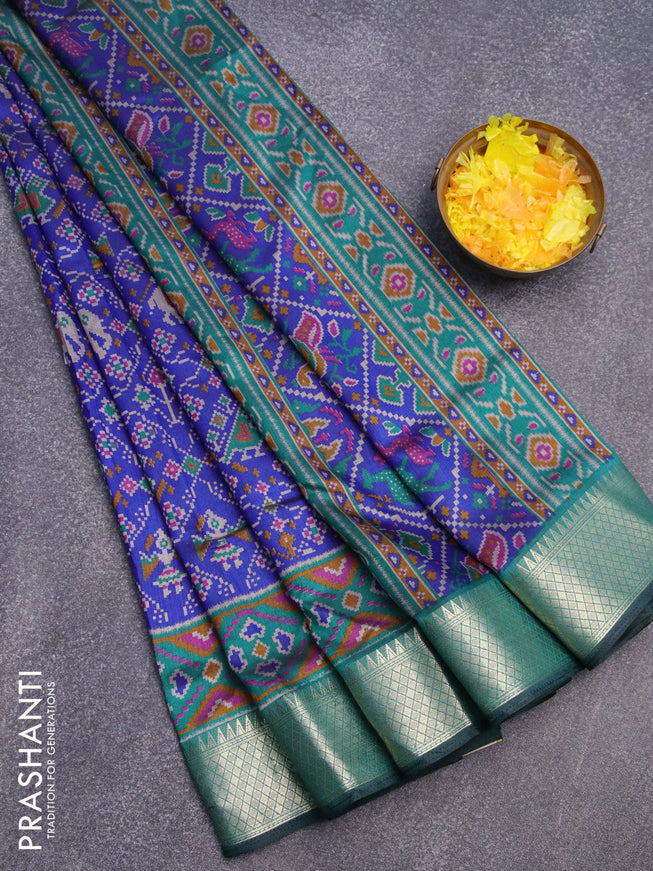 Semi tussar saree blue and peacock green with allover ikat weaves and zari woven border