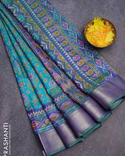 Semi tussar saree dual shade of teal bluish green and dual shade of blue with allover ikat weaves and zari woven border