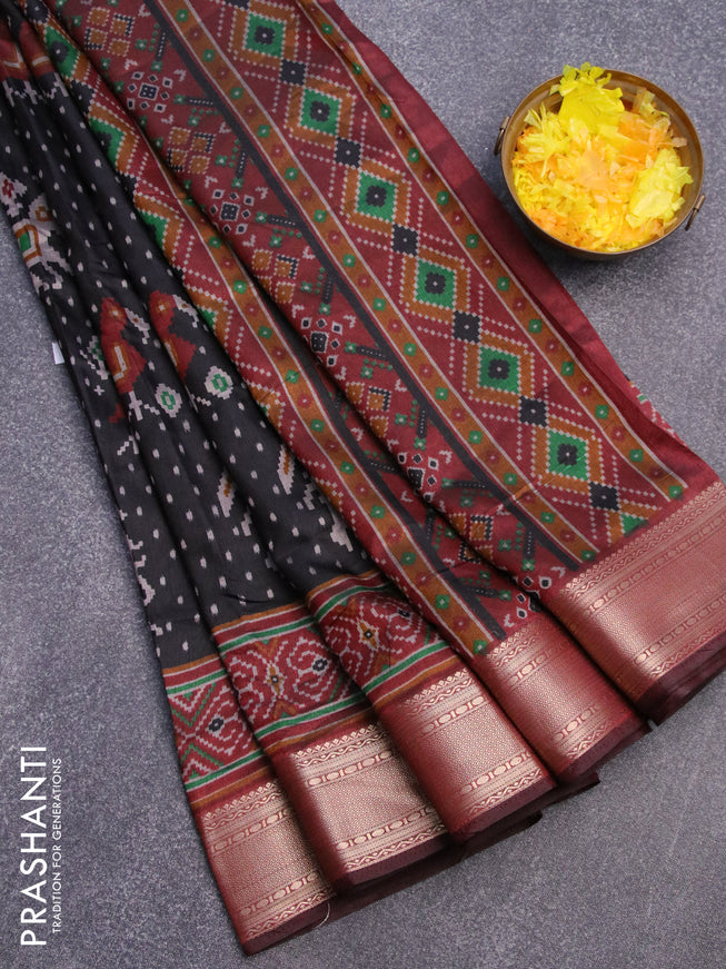 Semi tussar saree black and deep maroon with allover ikat weaves and zari woven border