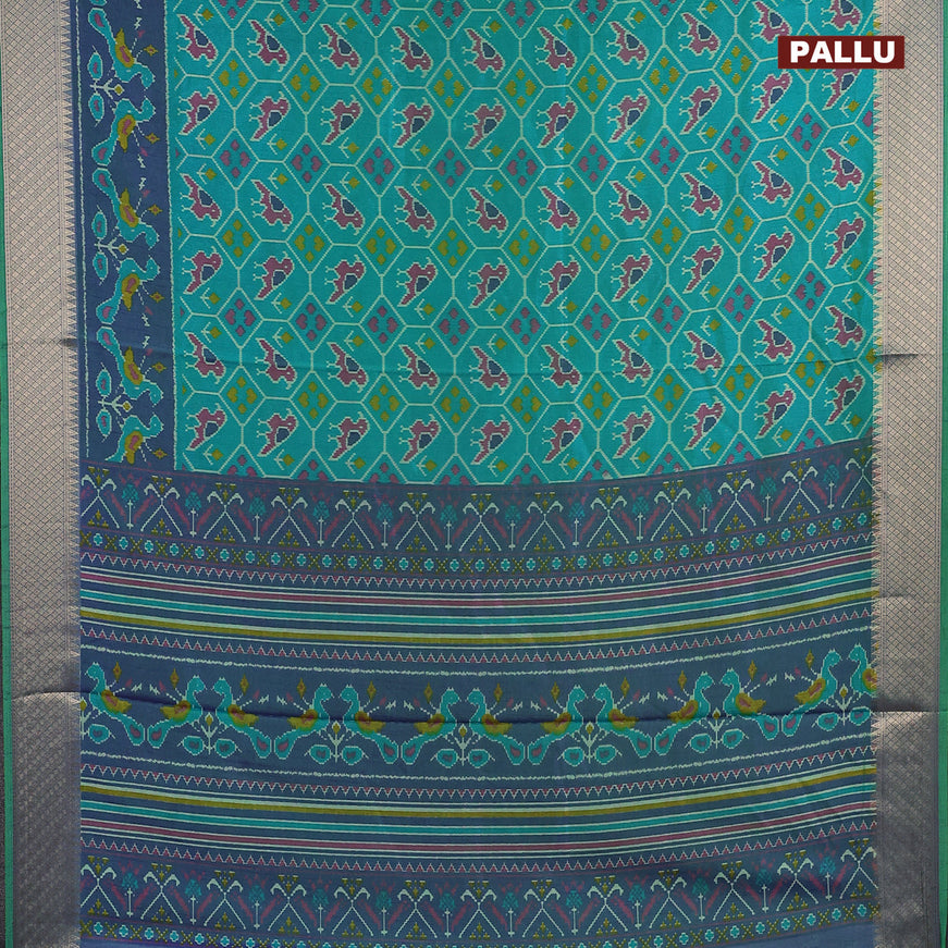 Semi tussar saree teal bluish green and dual shade of blue with allover ikat weaves and zari woven border
