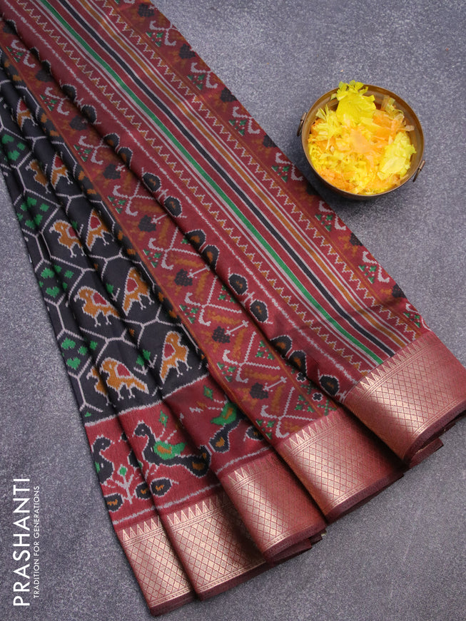 Semi tussar saree black and deep maroon with allover ikat weaves and zari woven border