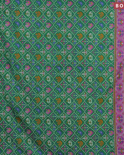 Semi tussar saree green and dual shade of purple with allover ikat weaves and zari woven border