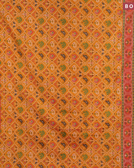 Semi tussar saree mustard yellow and red shade with allover ikat weaves and zari woven border
