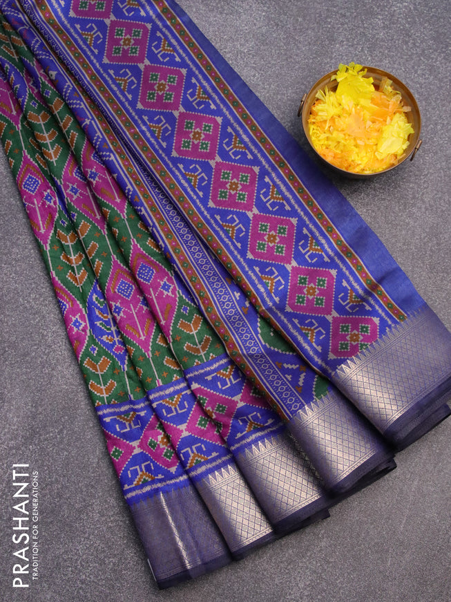Semi tussar saree dark green purple and blue with allover ikat weaves and zari woven border