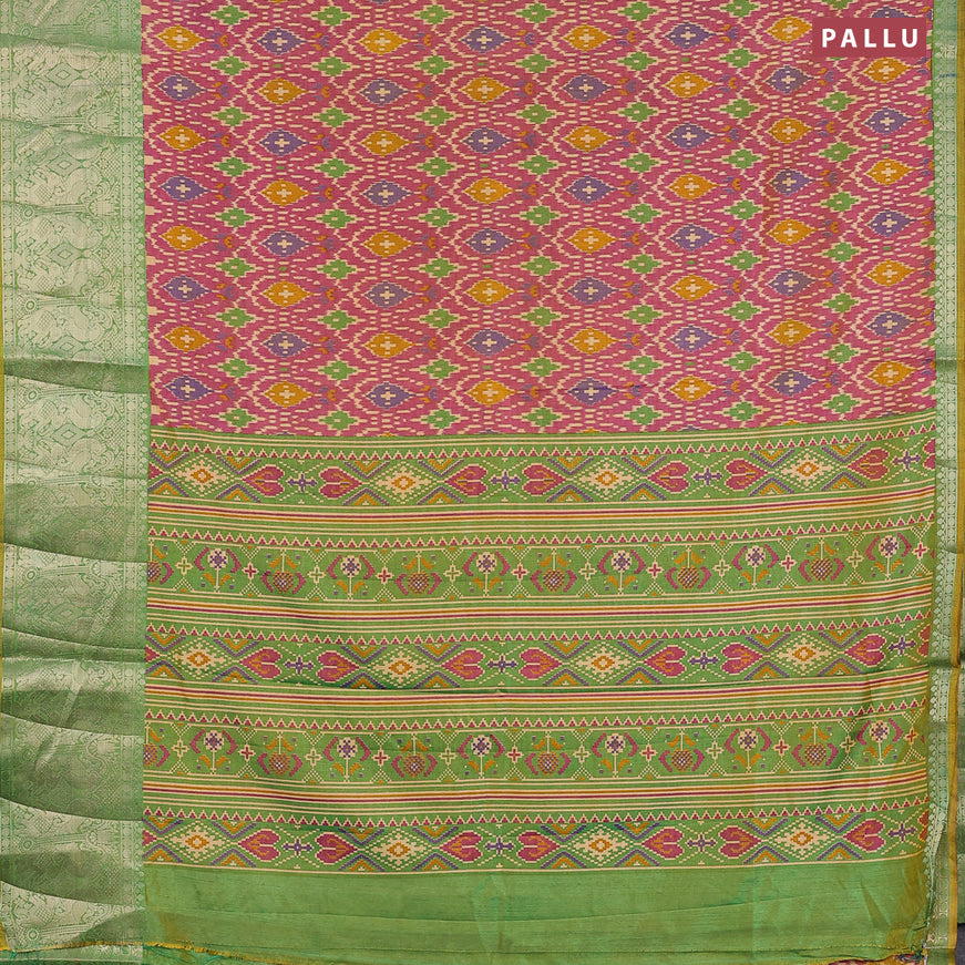 Semi tussar saree magenta pink and green with allover ikat weaves and zari woven border