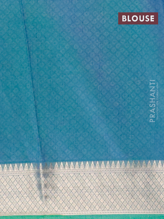 Semi tussar saree green and dual shde of blue with allover ikat weaves and zari woven border