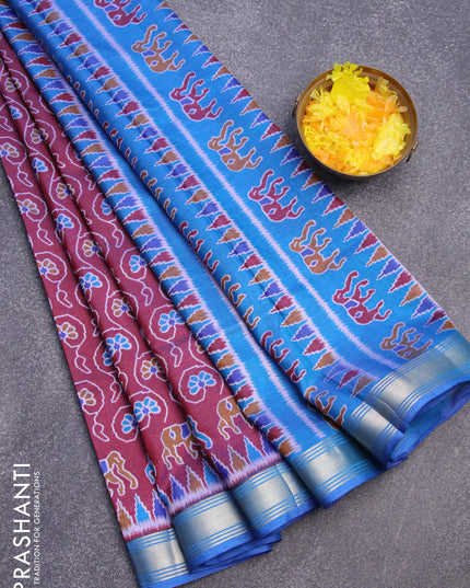 Semi tussar saree deep maroon and cs blue with allover floral prints and zari woven border