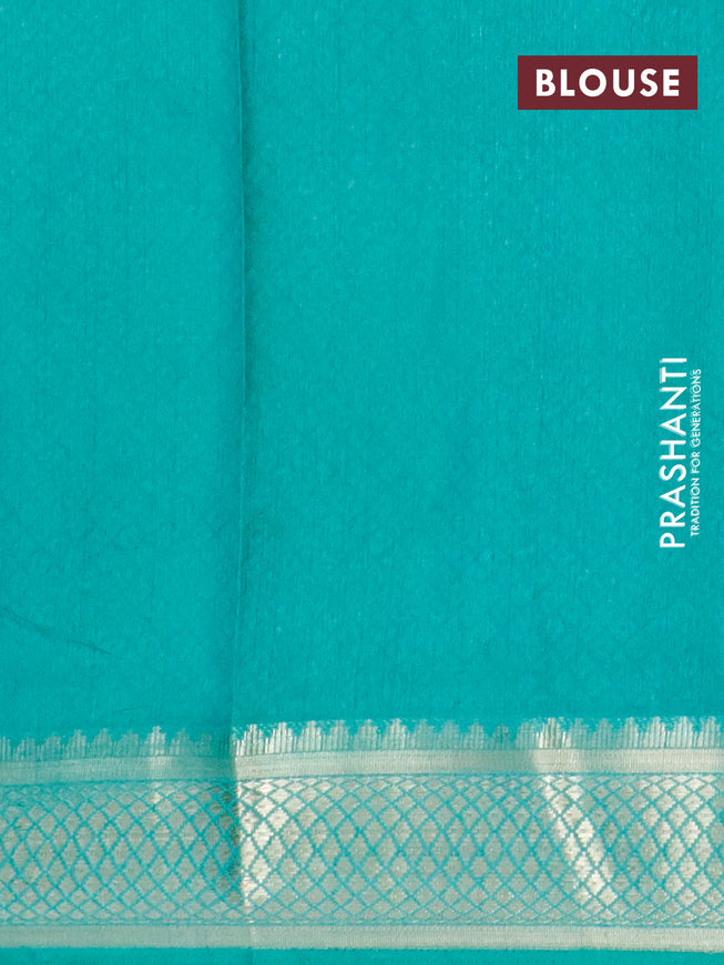 Semi tussar saree dual shade of greenish purple and green with allover floral prints and zari woven border