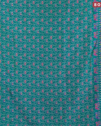 Semi tussar saree dual shade of teal blue and dual shade of blue with allover floral prints and zari woven border