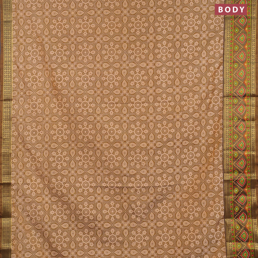 Semi tussar saree dual shade of mehendi green and brown shade with allover ajrakh weaves and zari woven ikat border