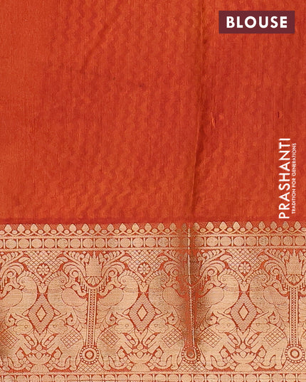 Semi tussar saree dual shade of pink and rustic orange with allover ikat weaves and zari woven border
