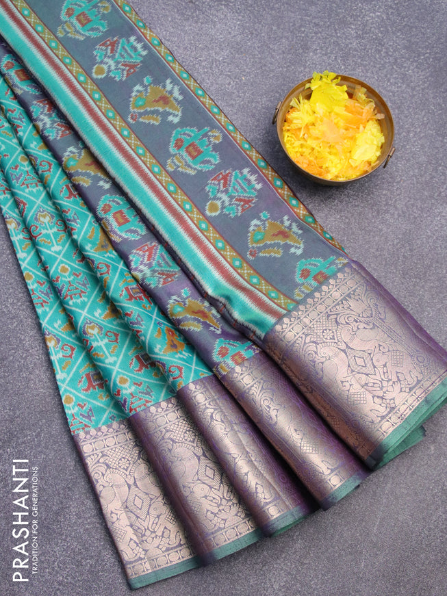 Semi tussar saree teal blue and greenish violet with allover ikat weaves and zari woven border