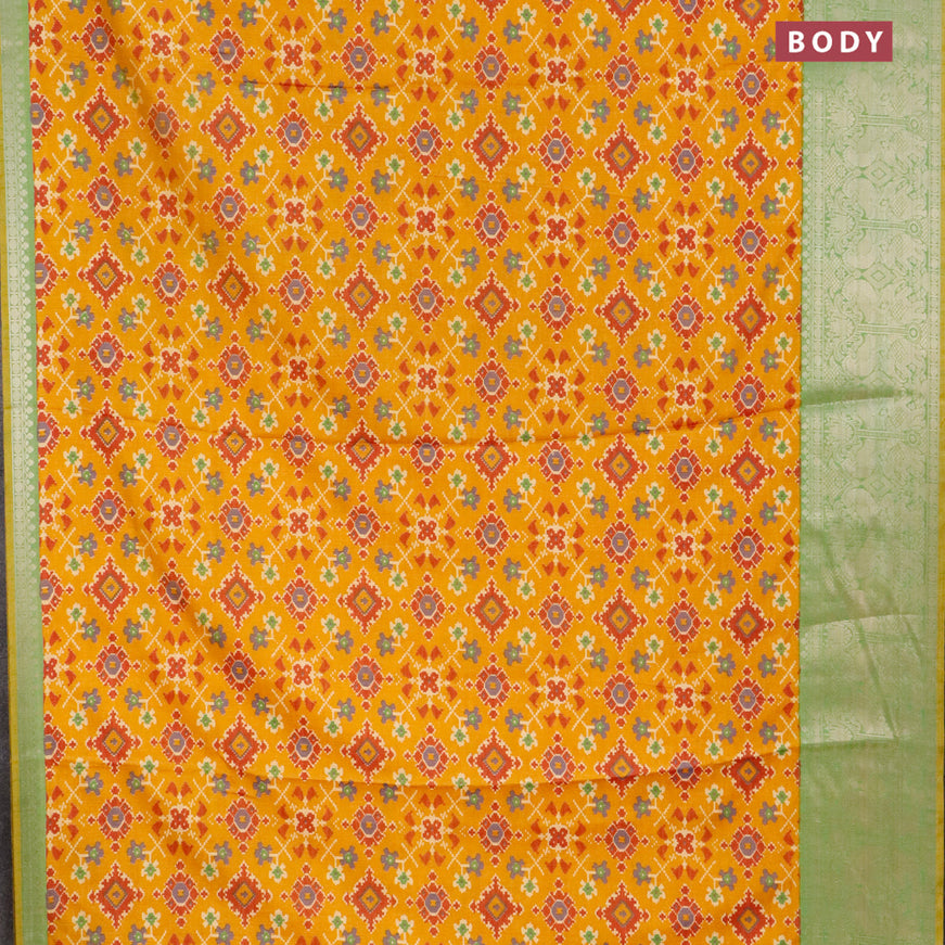 Semi tussar saree mustard yellow and green shade with allover ikat weaves and zari woven border