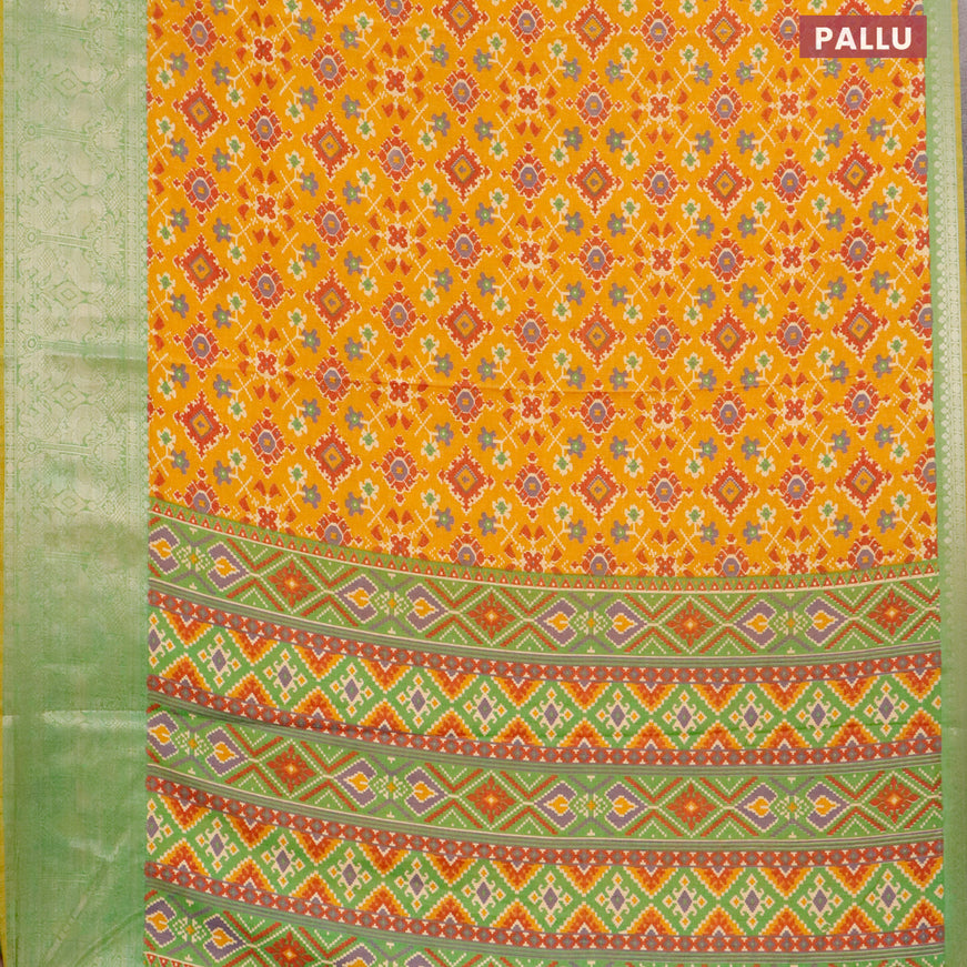 Semi tussar saree mustard yellow and green shade with allover ikat weaves and zari woven border