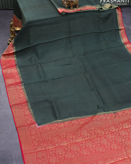 Dola silk saree bottle green and red with allover zari stripe weaves and zari woven border & zari butta blouse