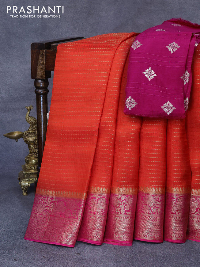 Dola silk saree orange and pink with allover zari stripe weaves and zari woven border & zari butta blouse