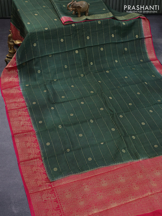 Dola silk saree dark green and pink with allover zari stripes & butta weaves and zari woven border & zari butta blouse