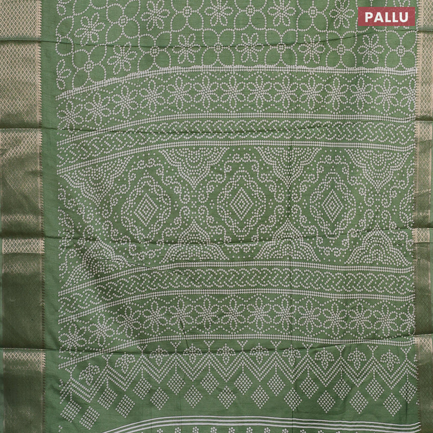 Semi dola saree green shade with allover bandhani prints and zari woven border
