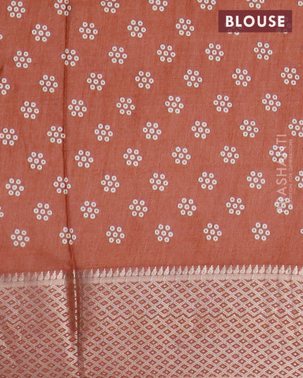 Semi dola saree brown with allover bandhani prints and zari woven border