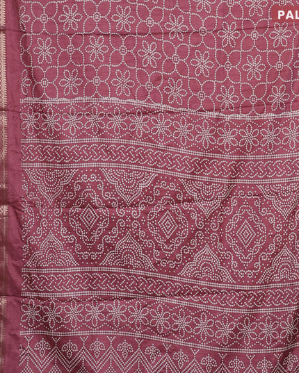 Semi dola saree teal blue with allover bandhani prints and zari woven border