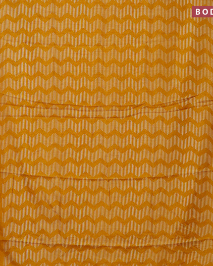 Semi dola saree mustard yellow with allover geometric prints and zari woven border