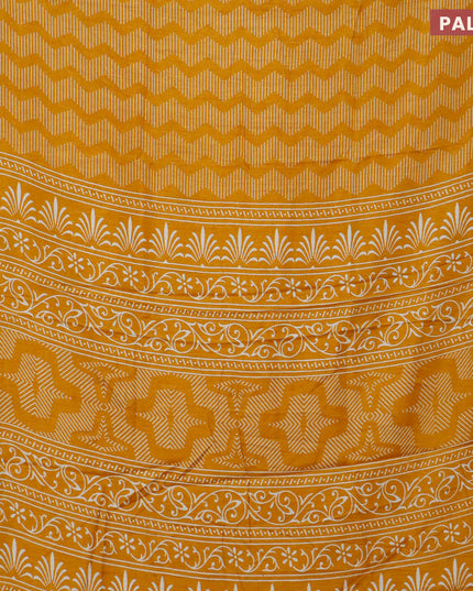 Semi dola saree mustard yellow with allover geometric prints and zari woven border