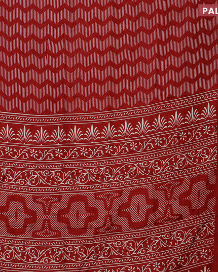 Semi dola saree maroon with allover geometric prints and zari woven border