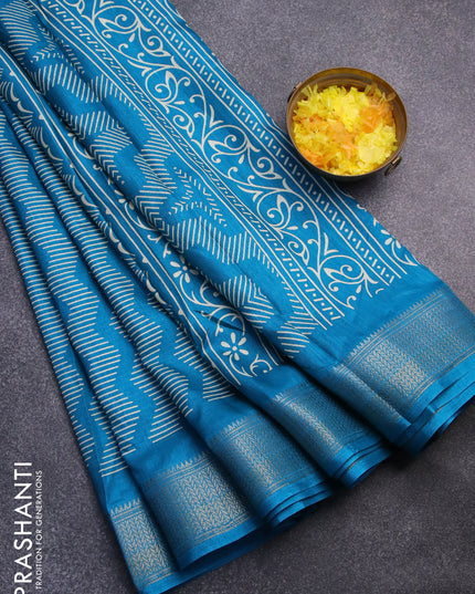 Semi dola saree cs blue with allover geometric prints and zari woven border