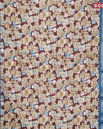 Semi dola saree brown and cs blue with allover floral prints and zari woven border