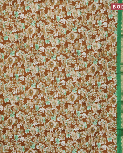 Semi dola saree brown and green with allover floral prints and zari woven border