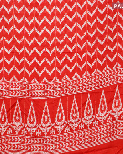 Semi dola saree red with allover prints and zari woven border