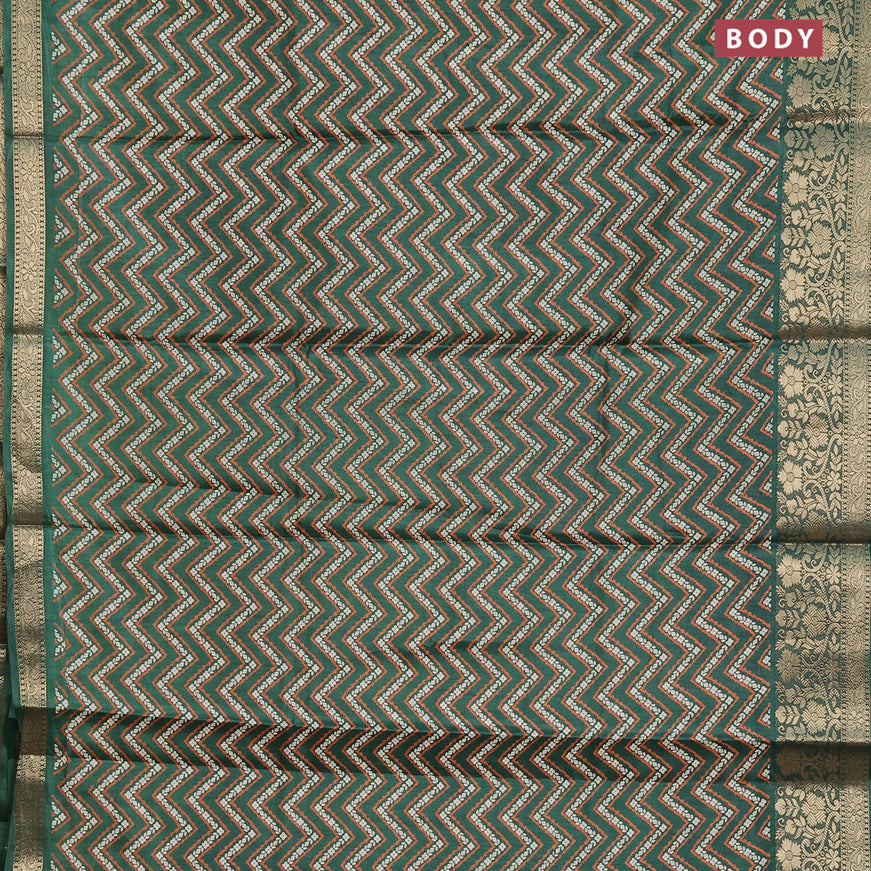 Semi dola saree green with allover zig zag prints and zari woven border